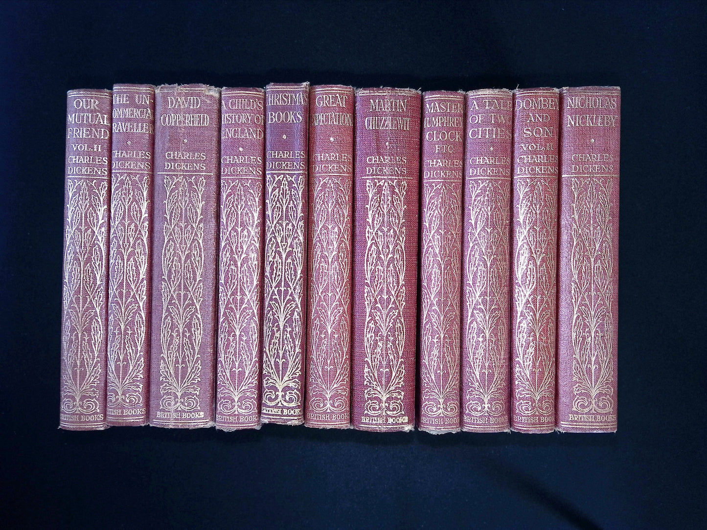 Twenty-four volume set of The Complete Works of Charles Dickens (Oliver Twist volume not present)